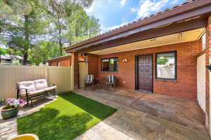 View of yard with a patio area