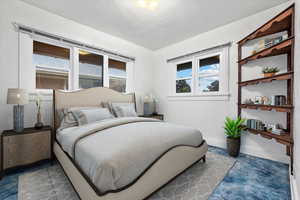 Bedroom with custom built shelves