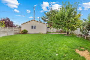 View of backyard and detached garage