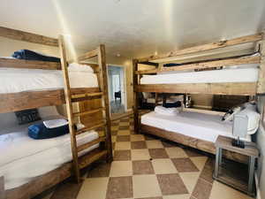 Bedroom featuring tile patterned floors