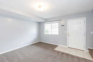 Family room with NEW carpet.