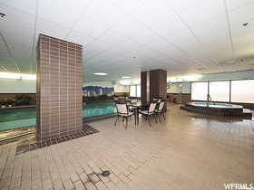 Dining area featuring a drop ceiling