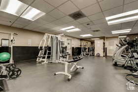 Gym featuring a paneled ceiling