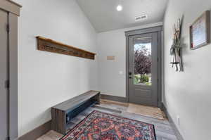 Doorway featuring light hardwood / wood-style floors