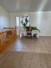 Interior space featuring light tile patterned floors