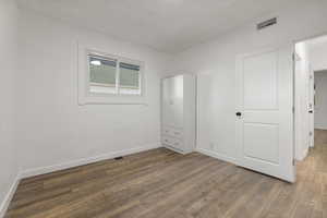 bedroom 2 featuring hardwood / wood-style flooring