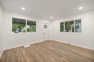 Spare room featuring hardwood / wood-style flooring