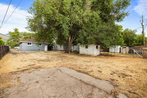 View of yard with a shed