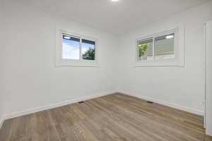 Bedroom 2 with hardwood / wood-style flooring