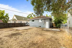 Back of property with a patio area