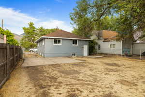 Rear view of property with a patio