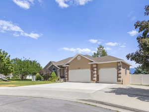 View of front of house featuring 3 car garage.