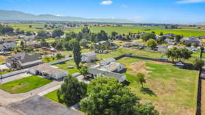 Drone / aerial view featuring a mountain view