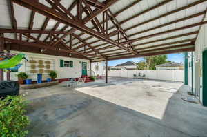 View of covered patio between home and garage