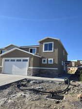 View of front of home with a garage