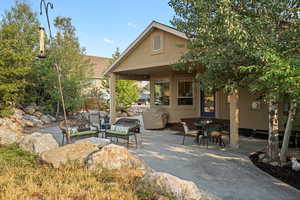 View of patio with an outdoor living space