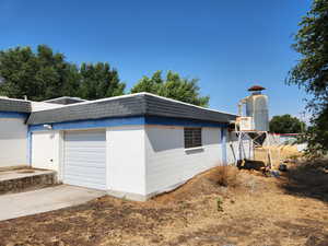 Dust collection system on exterior of building.