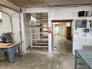 Storage Rack and Central Hallway.