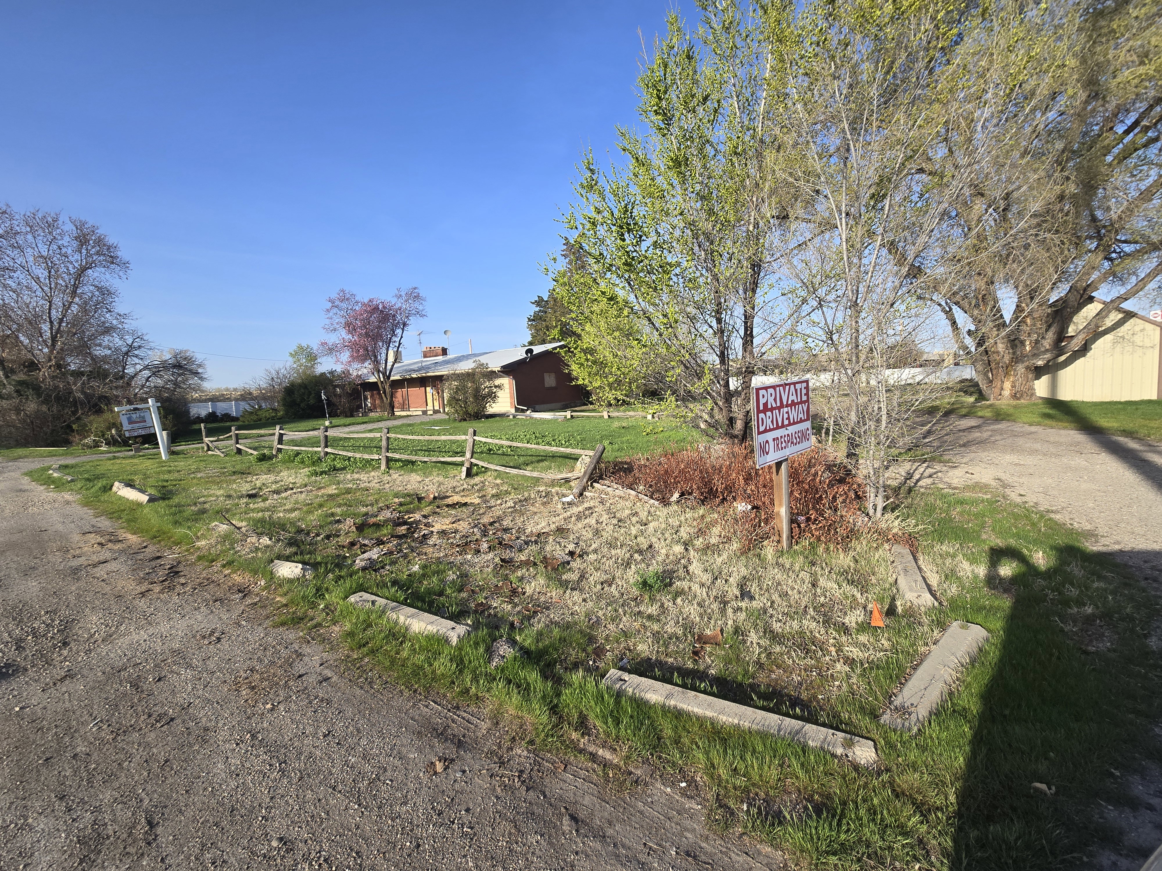 View of yard featuring fence