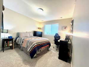 Bedroom featuring carpet flooring