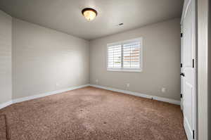 Carpeted Bedroom 2