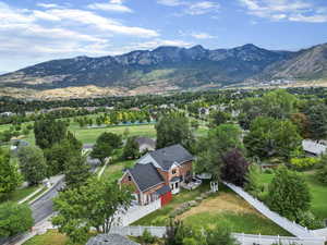 Birds eye view of property with a mountain view