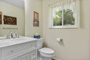 Bathroom with vanity and toilet