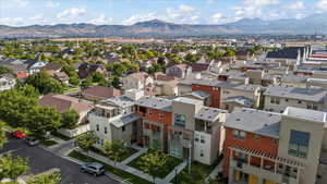 Birds eye view of property with a mountain view