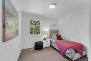 View of carpeted bedroom