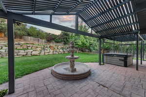 View of patio with a pergola