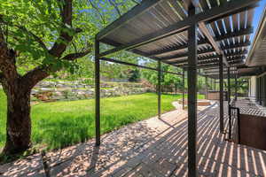 View of patio featuring a pergola