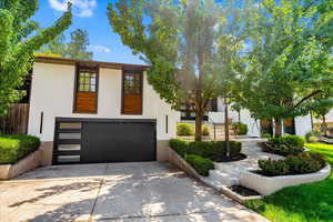 View of front of home featuring a garage