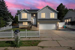 Bi-level home with a garage and RV parking