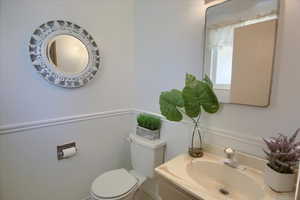 Bathroom with vanity and toilet