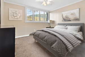 Bedroom 1: VIRTUALLY STAGED BED AND ARTWORK  above bed.