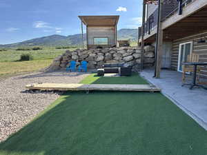 View of yard with a mountain view