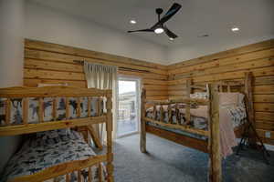 Carpeted bedroom with access to outside, ceiling fan, and recessed lighting