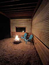 Interior space featuring wood walls