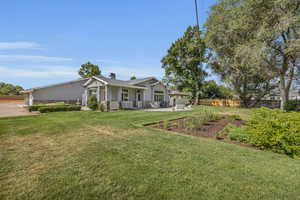 Exterior space featuring a lawn and a patio