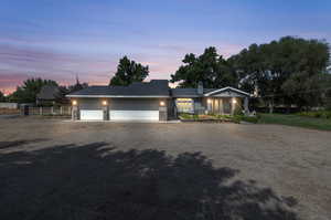 Ranch-style home featuring a garage