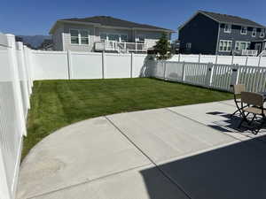 View of yard with a patio