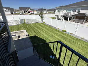 View of yard with a deck