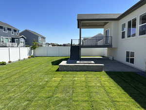 View of yard with a patio