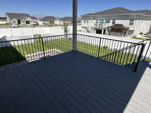 Deck featuring a lawn