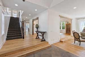 Entryway with light hardwood / wood-style flooring