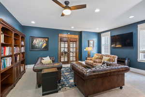 Office space with ceiling fan, french doors, and a wealth of natural light