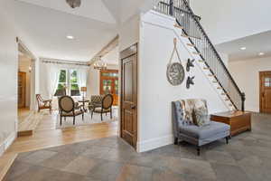 Interior space featuring wood-type flooring and an inviting chandelier