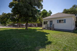 Front view of the property with a lawn