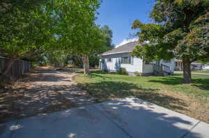 View of front of property with a front lawn