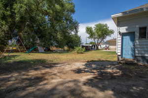 View of yard with a playground